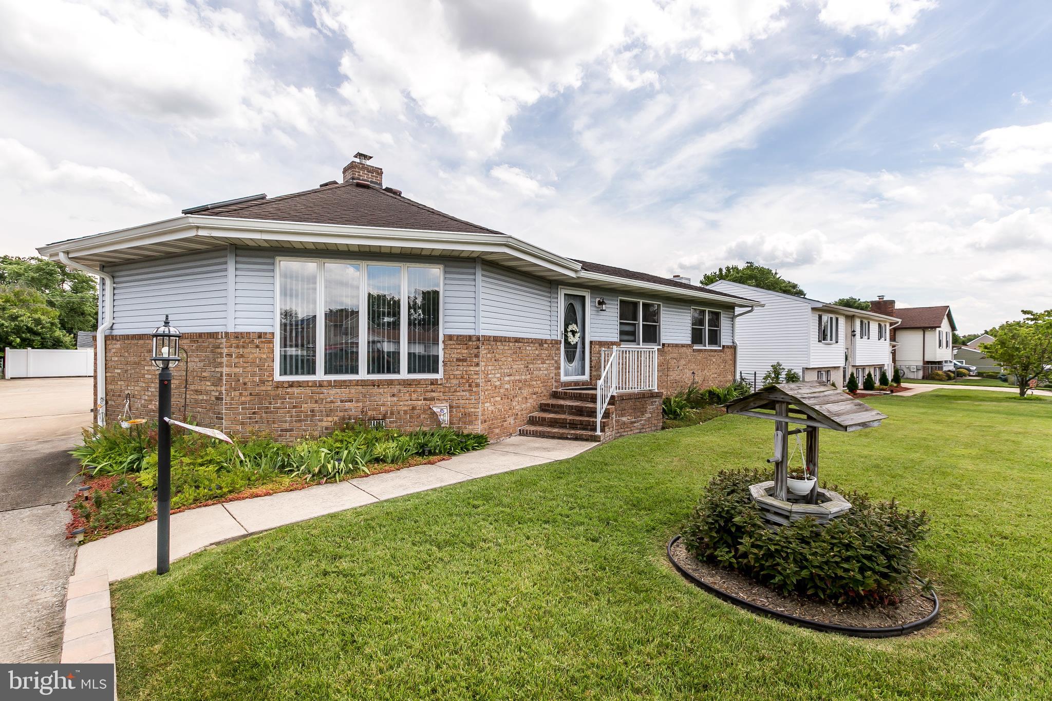 2507 Maple Road Baltimore, MD 21219 - Photo 2 of 29 a front view of a house with a yard