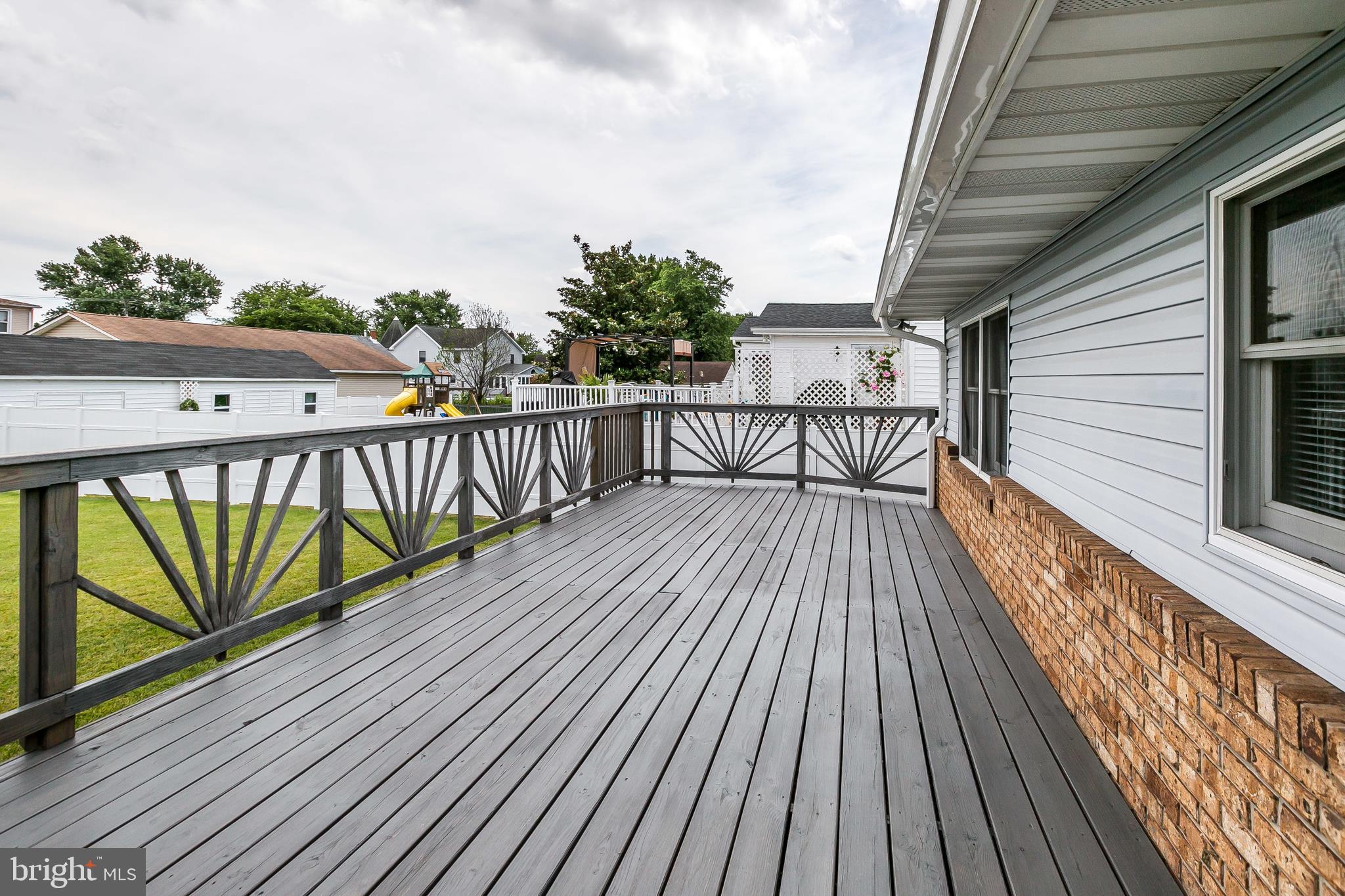 2507 Maple Road Baltimore, MD 21219 - Photo 27 of 29 a view of balcony with wooden floor and fence