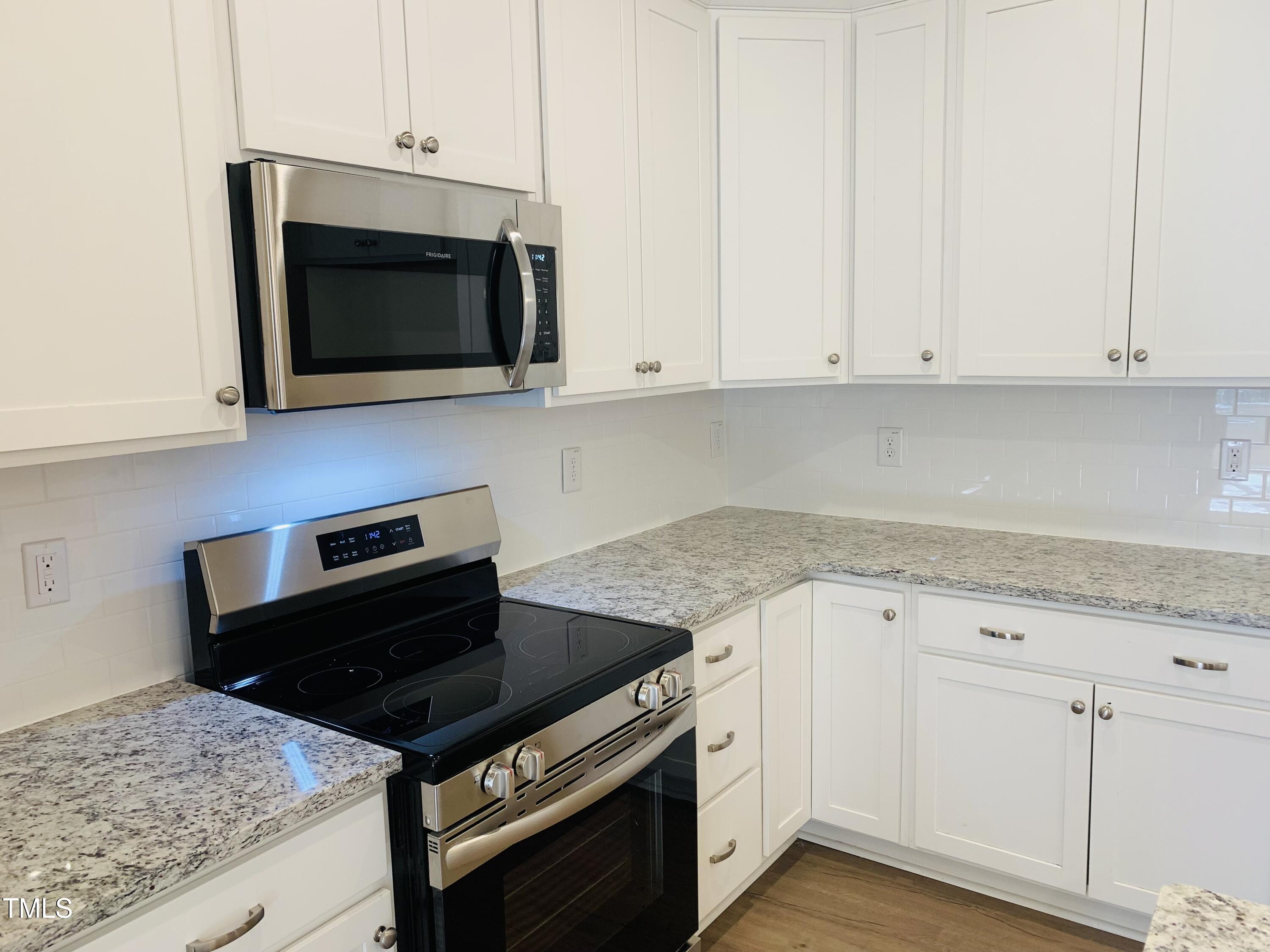 403 Weather Ridge Lane, Unit 42 Cary, NC 27513 - Photo 5 of 17 {WCC 403 Kitchen photo2