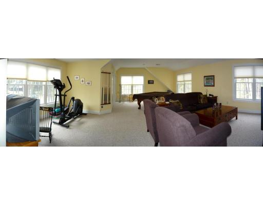 12 Hawthorn Road Amherst, MA 01002 - Photo 4 of 9 a living room with furniture and a gym equipment