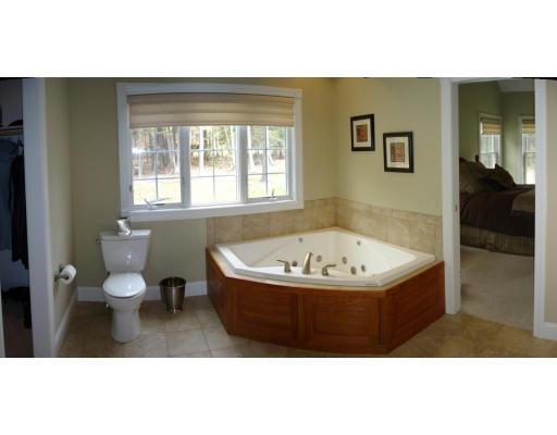 12 Hawthorn Road Amherst, MA 01002 - Photo 8 of 9 a view of bathroom with bathtub and window