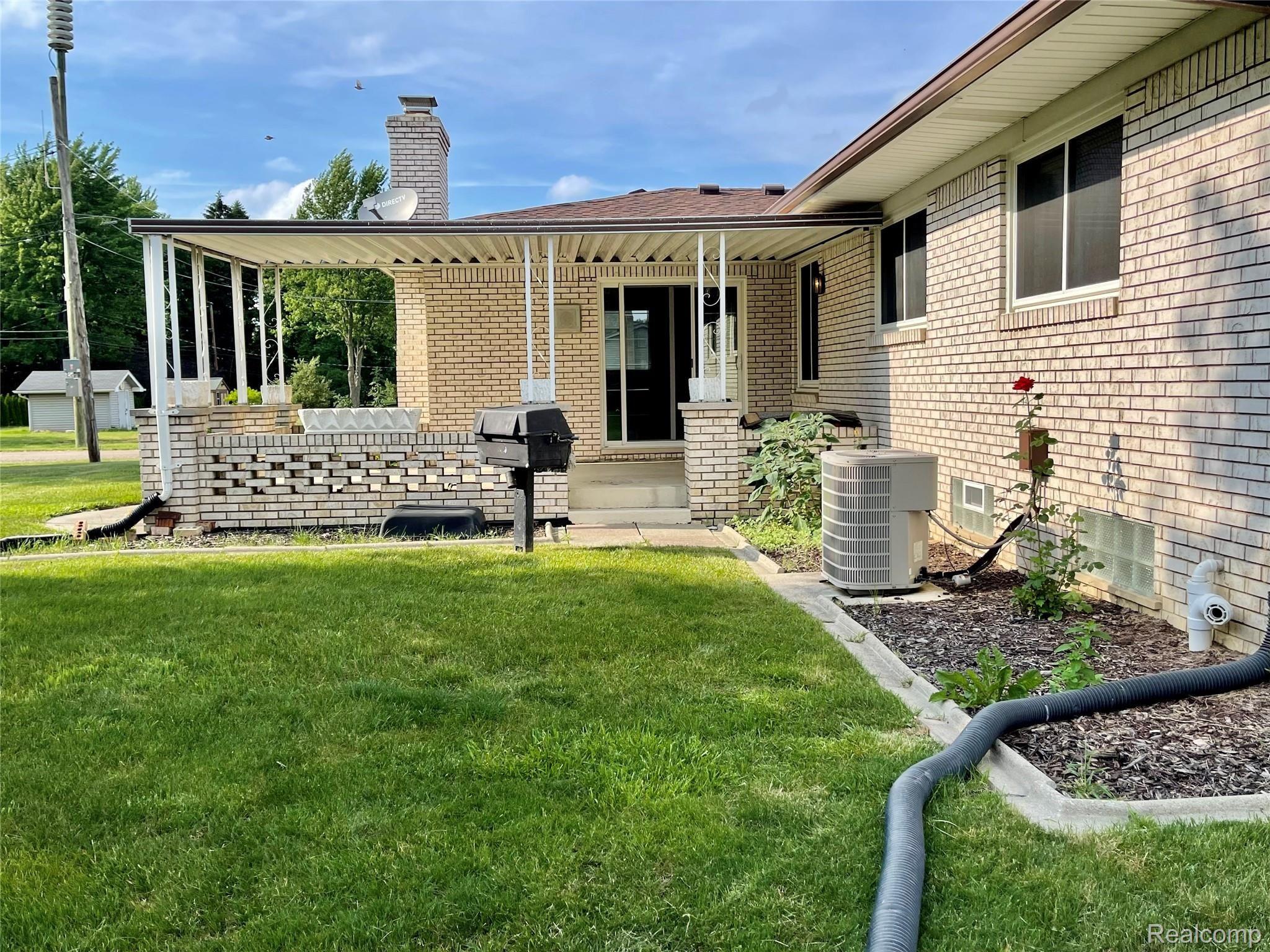 37481 Ryan Road Sterling Heights, MI 48310 - Photo 11 of 47 Covered Patio II.jpg