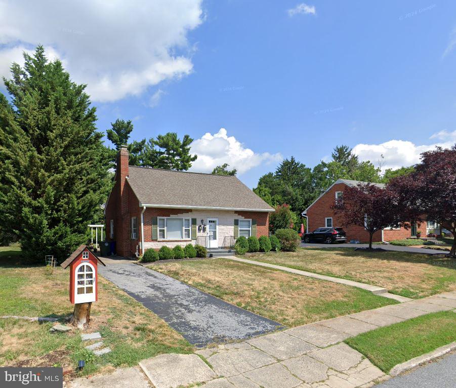 a house view with a garden space