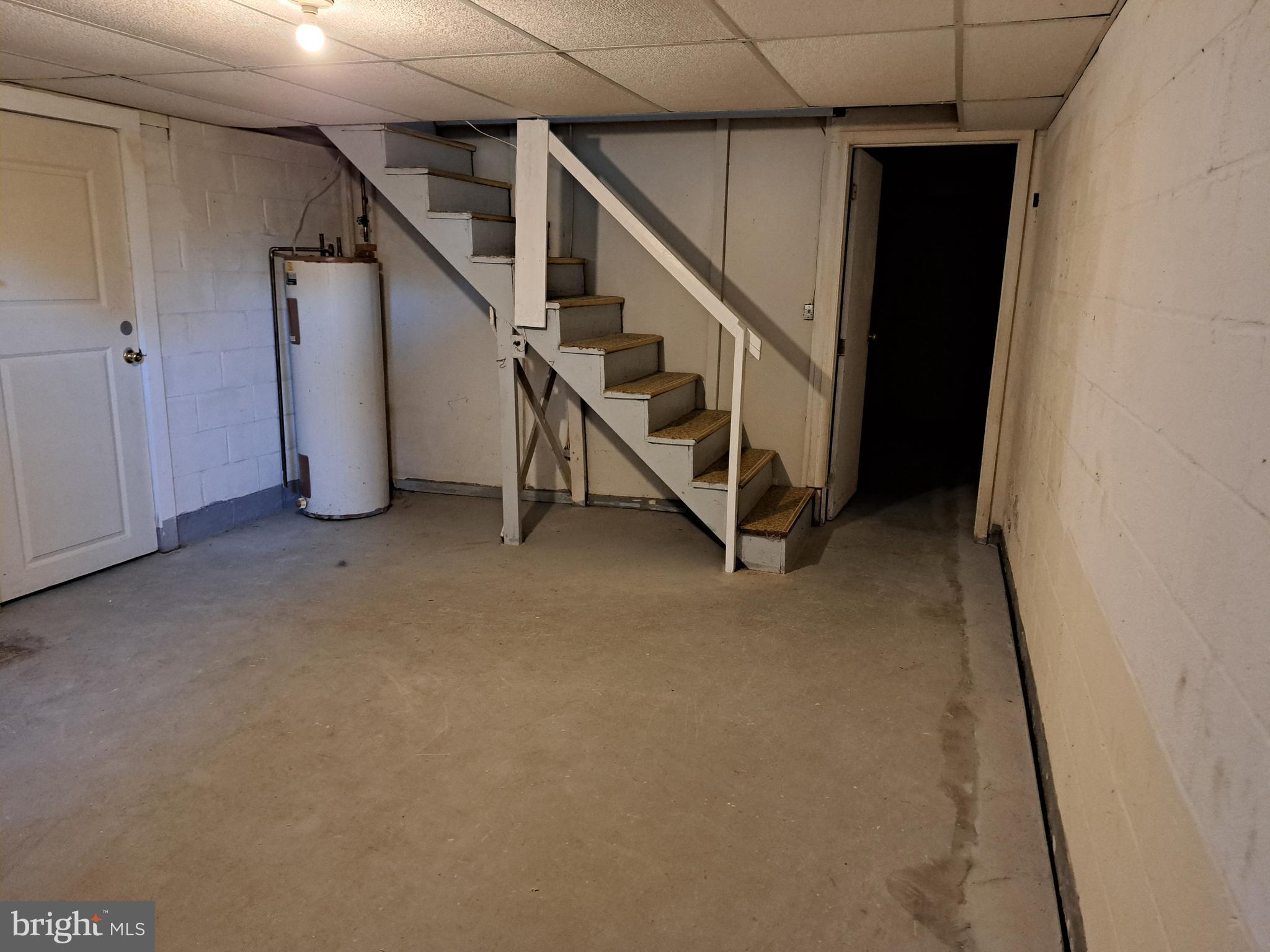 415 Biggs Avenue, Unit 1 Frederick, MD 21702 - Photo 28 of 29 a view of an empty room with stairs