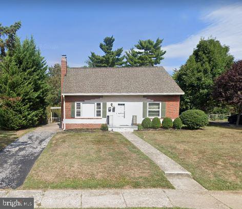 415 Biggs Avenue, Unit 1 Frederick, MD 21702 - Photo 29 of 29 a front view of a house with a yard and garage