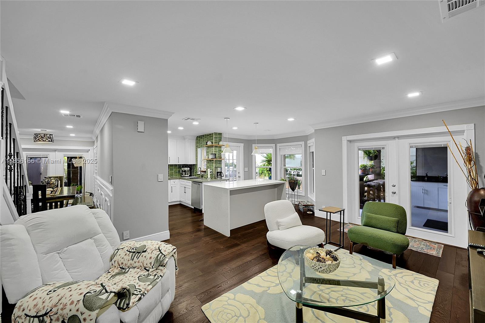 9398 Aegean Drive Boca Raton, FL 33496 - Photo 14 of 61 a living room with furniture and a view of kitchen