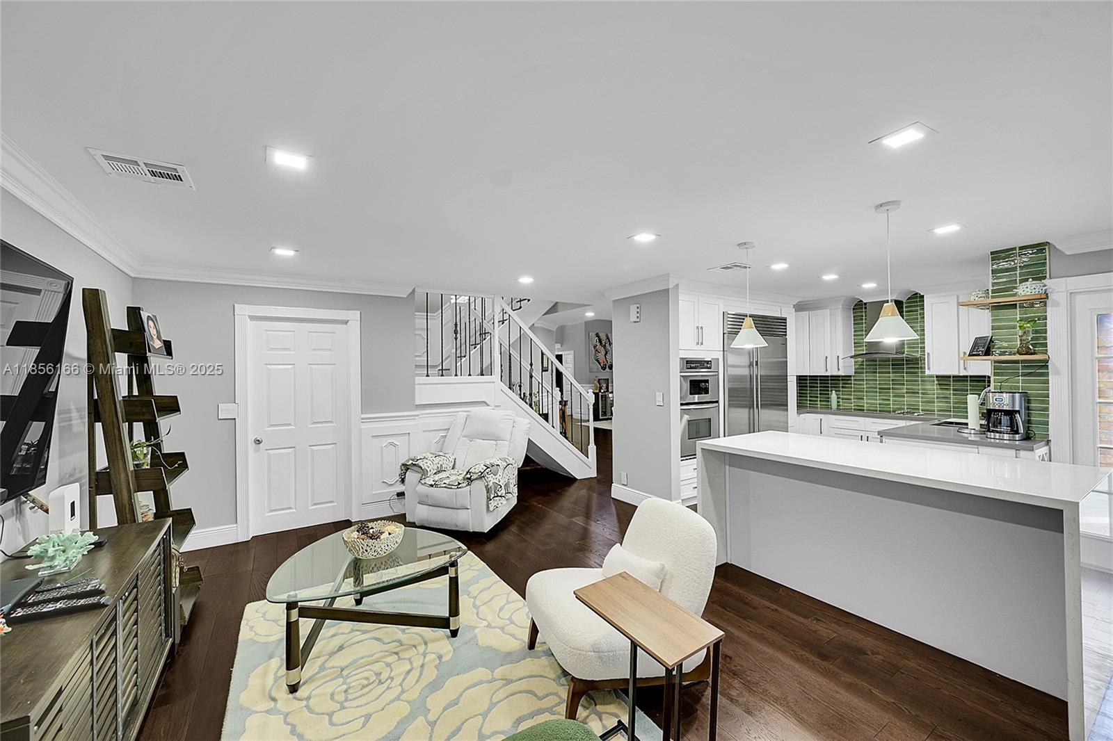 9398 Aegean Drive Boca Raton, FL 33496 - Photo 15 of 61 a living room with furniture and a large window