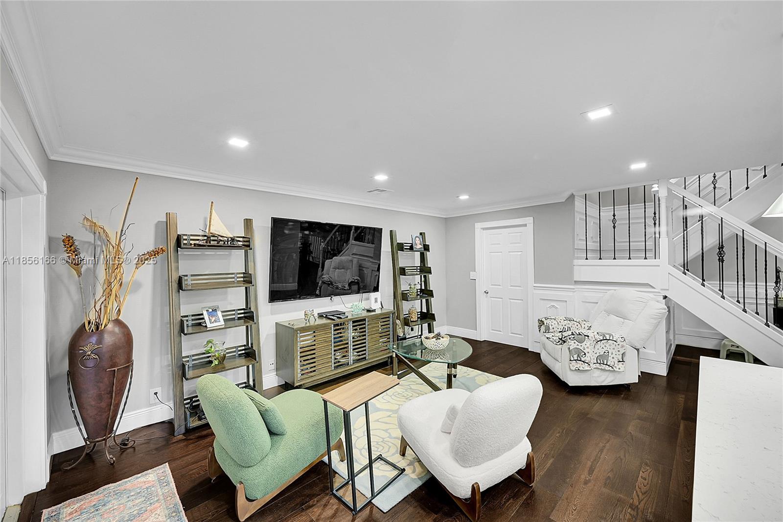 9398 Aegean Drive Boca Raton, FL 33496 - Photo 16 of 61 a living room with furniture and a flat screen tv