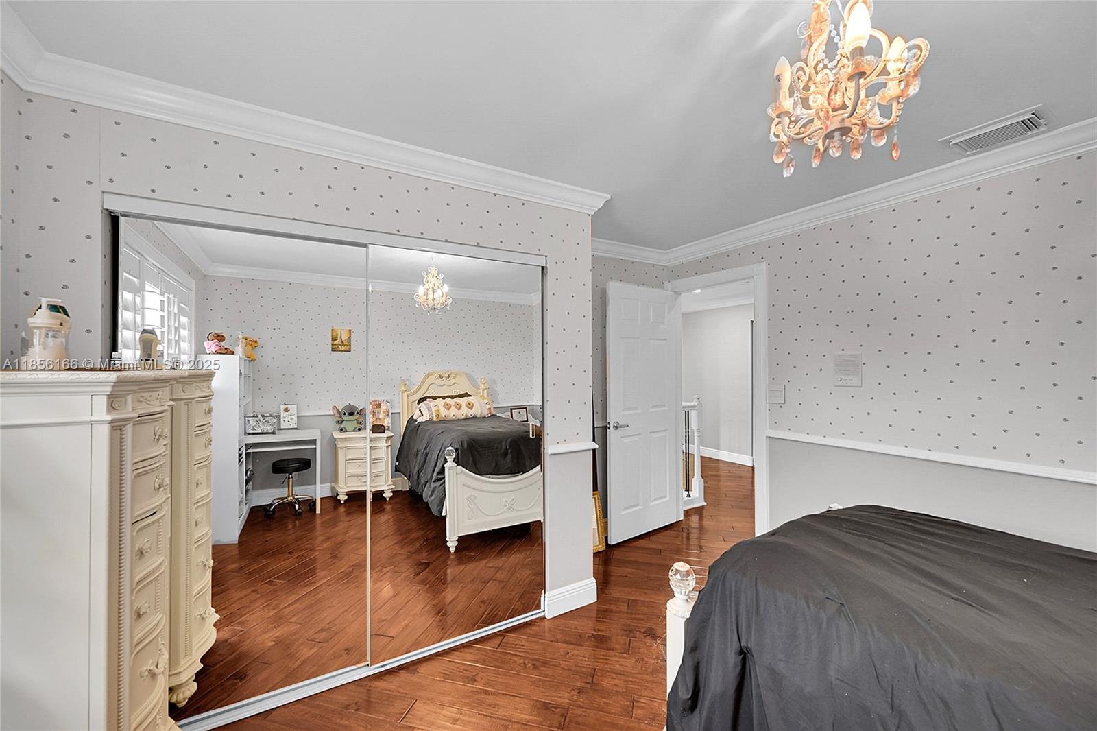 9398 Aegean Drive Boca Raton, FL 33496 - Photo 28 of 61 a bedroom with a bed and a view of living room