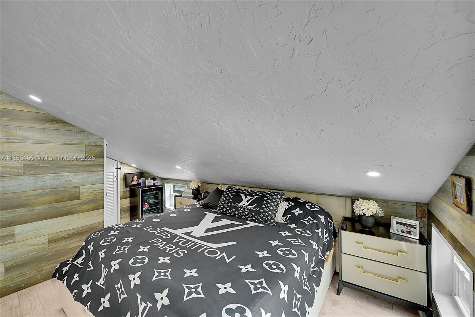 9398 Aegean Drive Boca Raton, FL 33496 - Photo 35 of 61 a bedroom with a large bed and a window