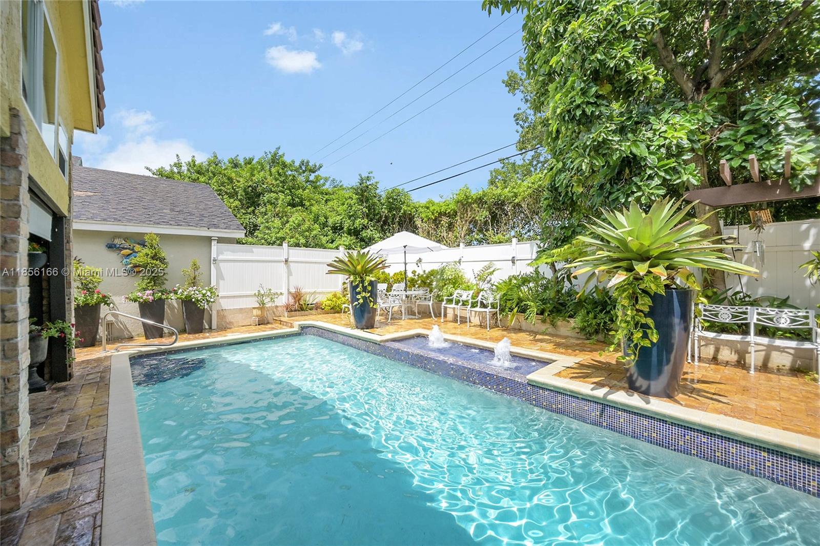 9398 Aegean Drive Boca Raton, FL 33496 - Photo 43 of 61 a view of swimming pool