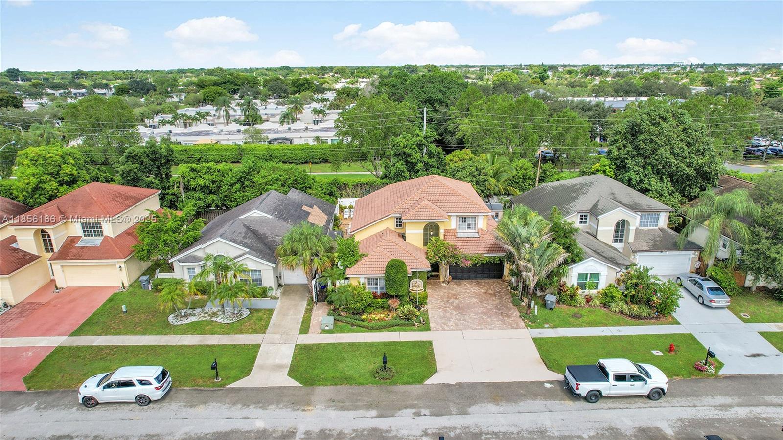 9398 Aegean Drive Boca Raton, FL 33496 - Photo 50 of 61 an aerial view of a house with garden space and street view