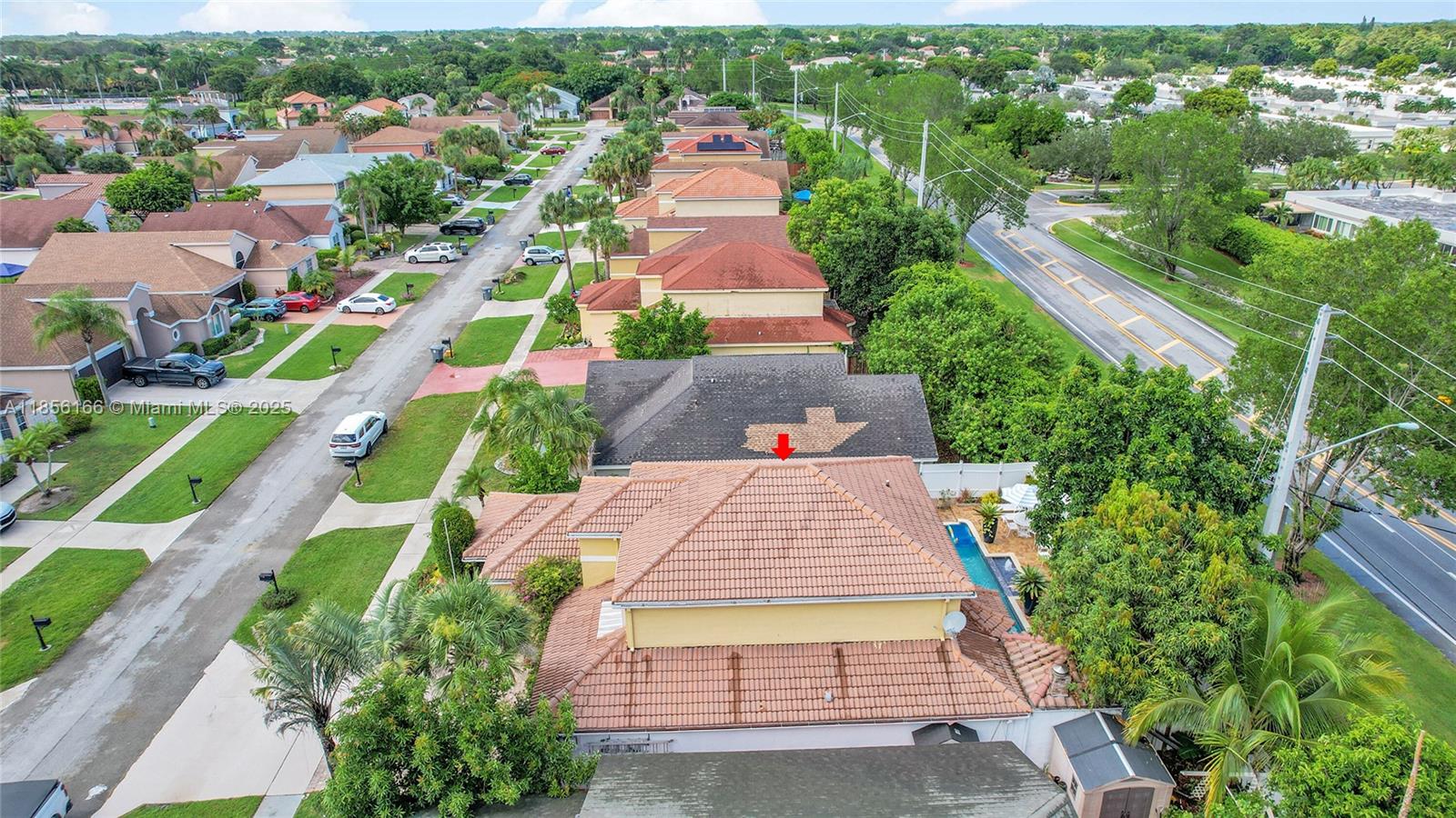 9398 Aegean Drive Boca Raton, FL 33496 - Photo 57 of 61 an aerial view of multiple houses with yard
