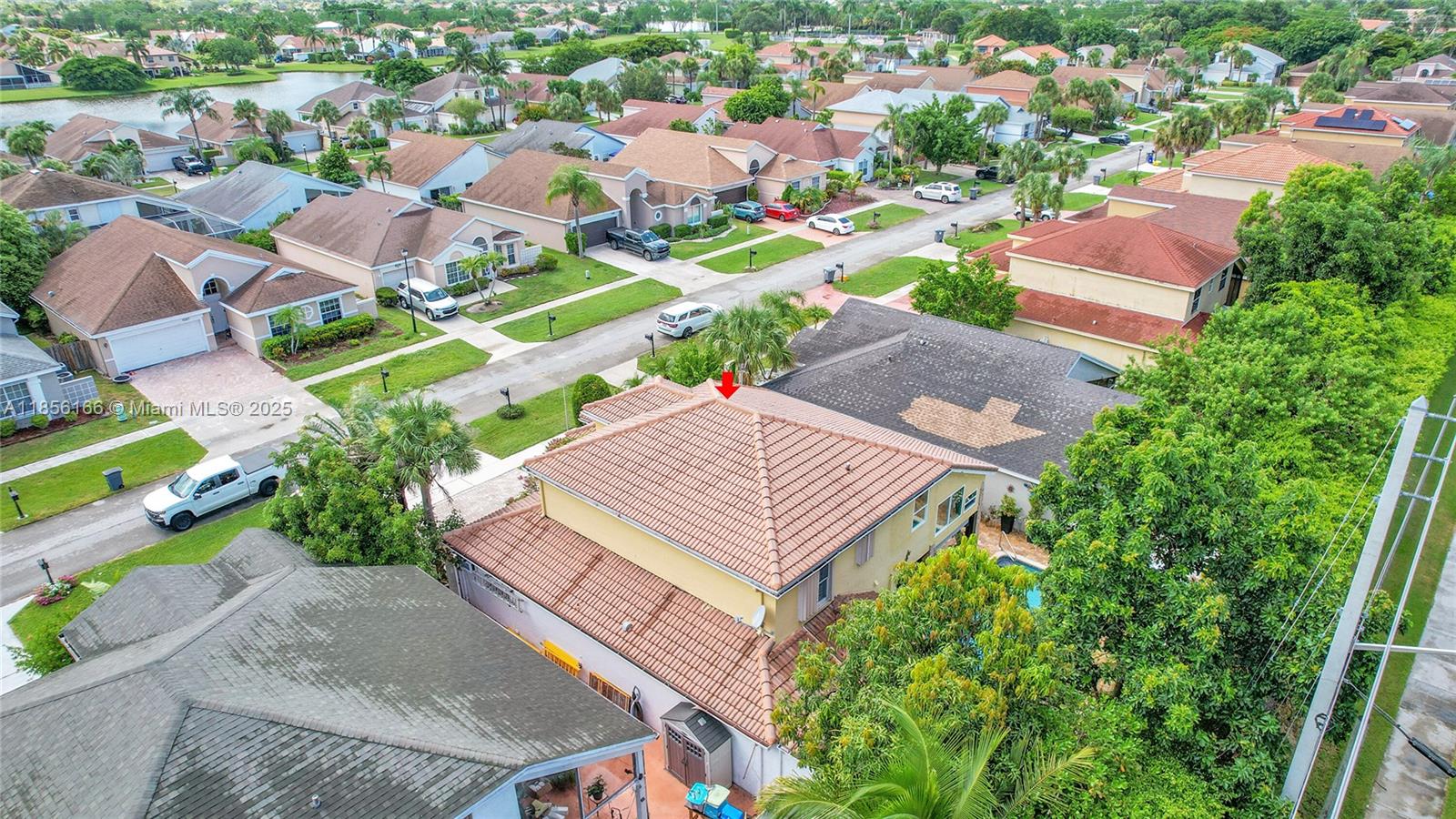 9398 Aegean Drive Boca Raton, FL 33496 - Photo 61 of 61 an aerial view of a house with a garden