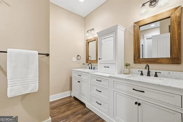 a bathroom with a shower and a window