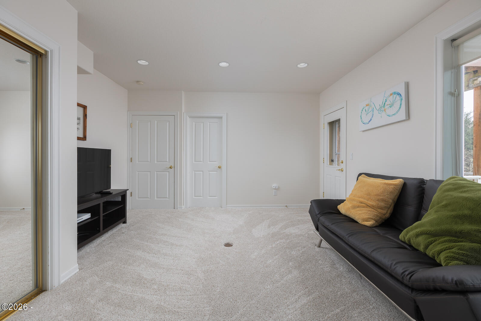7415 East Summit Road Pacific City, OR 97135 - Photo 26 of 44 a living room with furniture and a flat screen tv