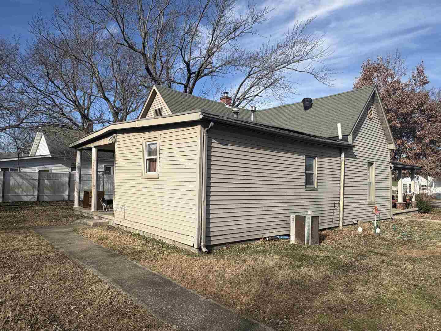 1615 West Chestnut Street Marion, IL 62959 - Photo 15 of 18 a view of a house with a yard and garage
