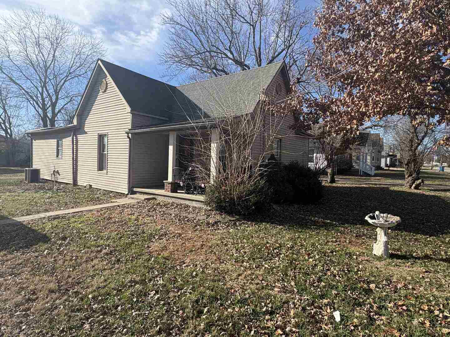 1615 West Chestnut Street Marion, IL 62959 - Photo 16 of 18 a view of a house with a yard