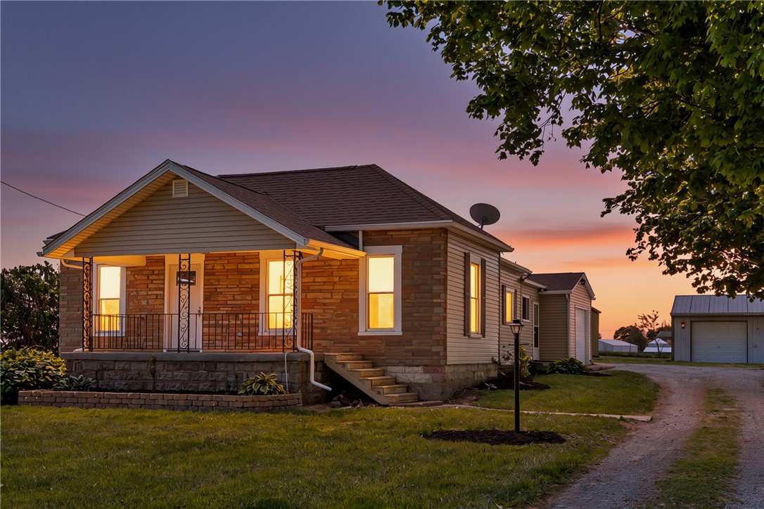 1217 Jasper Road Xenia, OH 45385 - Photo 61 of 62 This charming home features a lovely porch, offering a perfect blend of comfort and outdoor appeal.