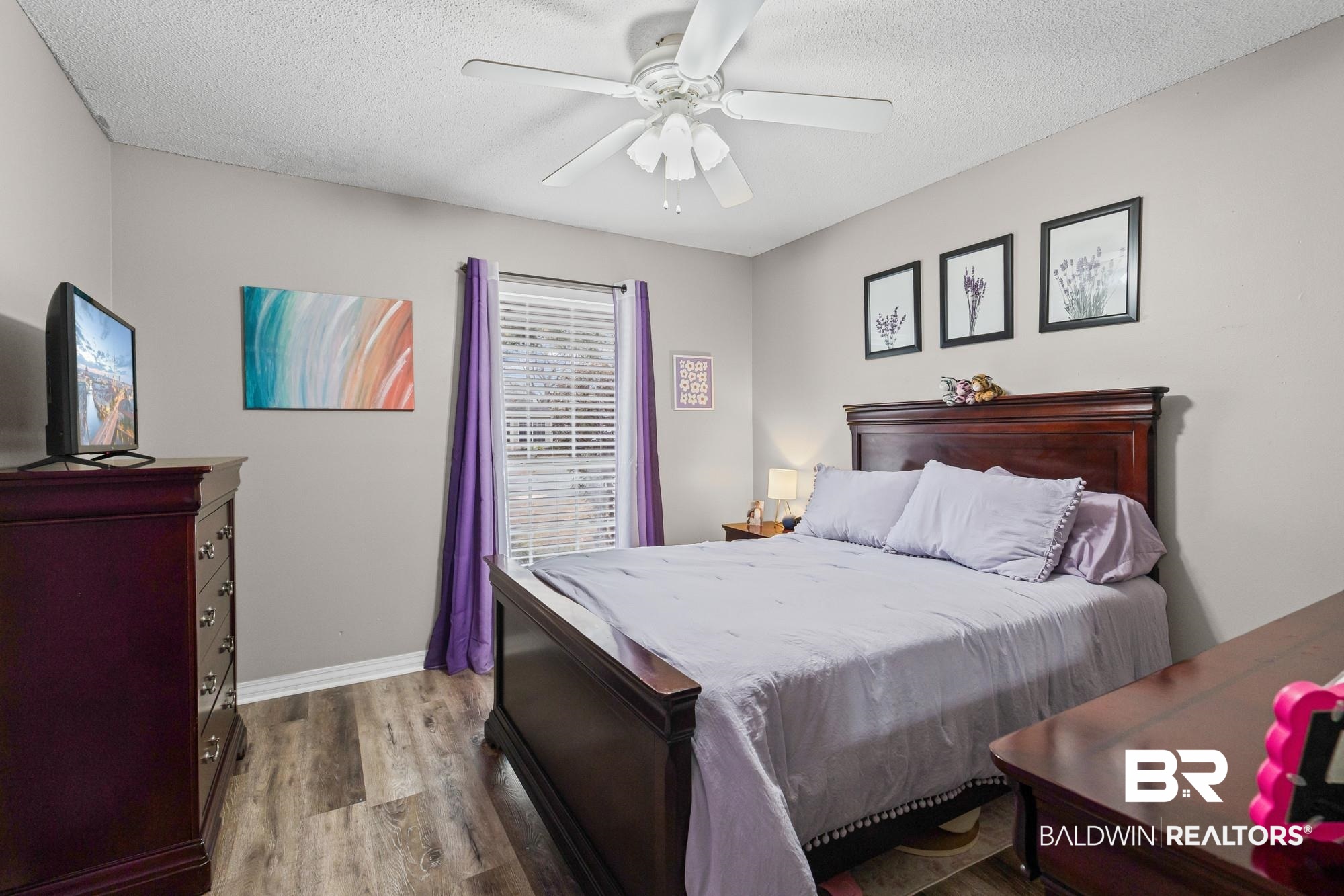 6609 Blakeley Court Mobile, AL 36695 - Photo 16 of 28 Bedroom with light wood finished floors, a textured ceiling, and a ceiling fan