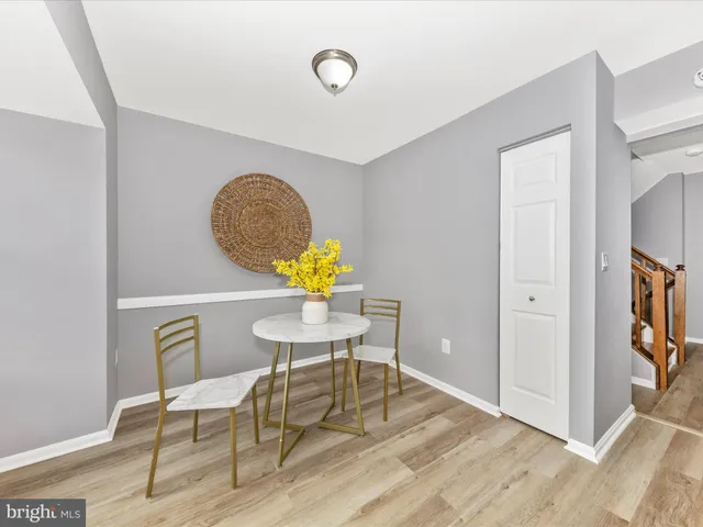 a view of dining room and wooden floor