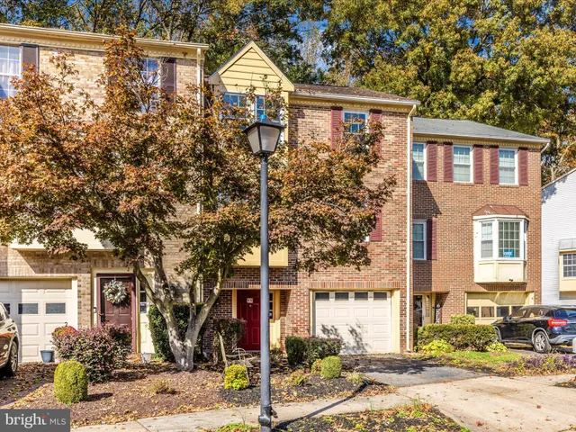 a front view of a house with street