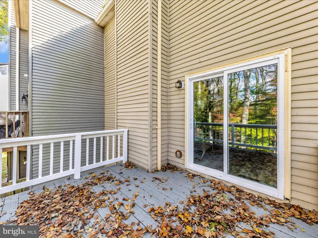 a view of a porch with a bench
