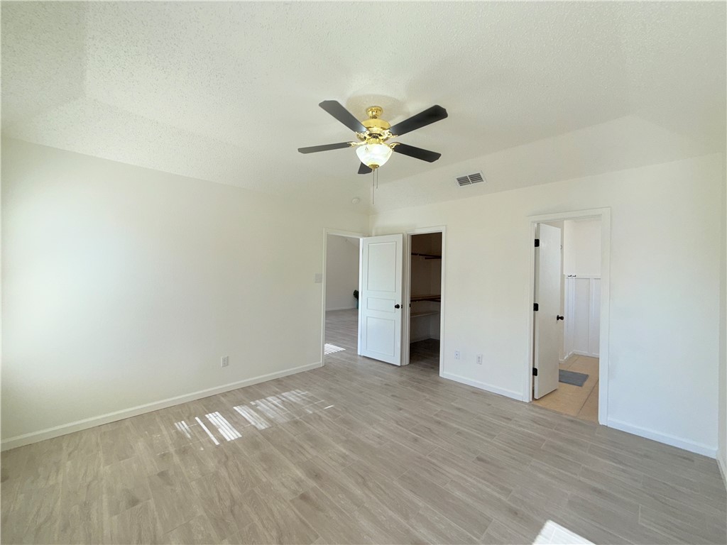 2229 Pebble Beach Drive Ingleside, TX 78362 - Photo 12 of 33 an empty room with a window and a ceiling fan