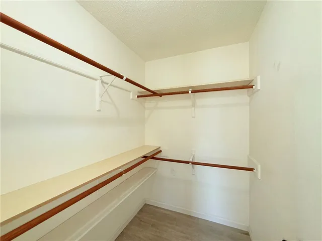 a view of a room with racks on the wall