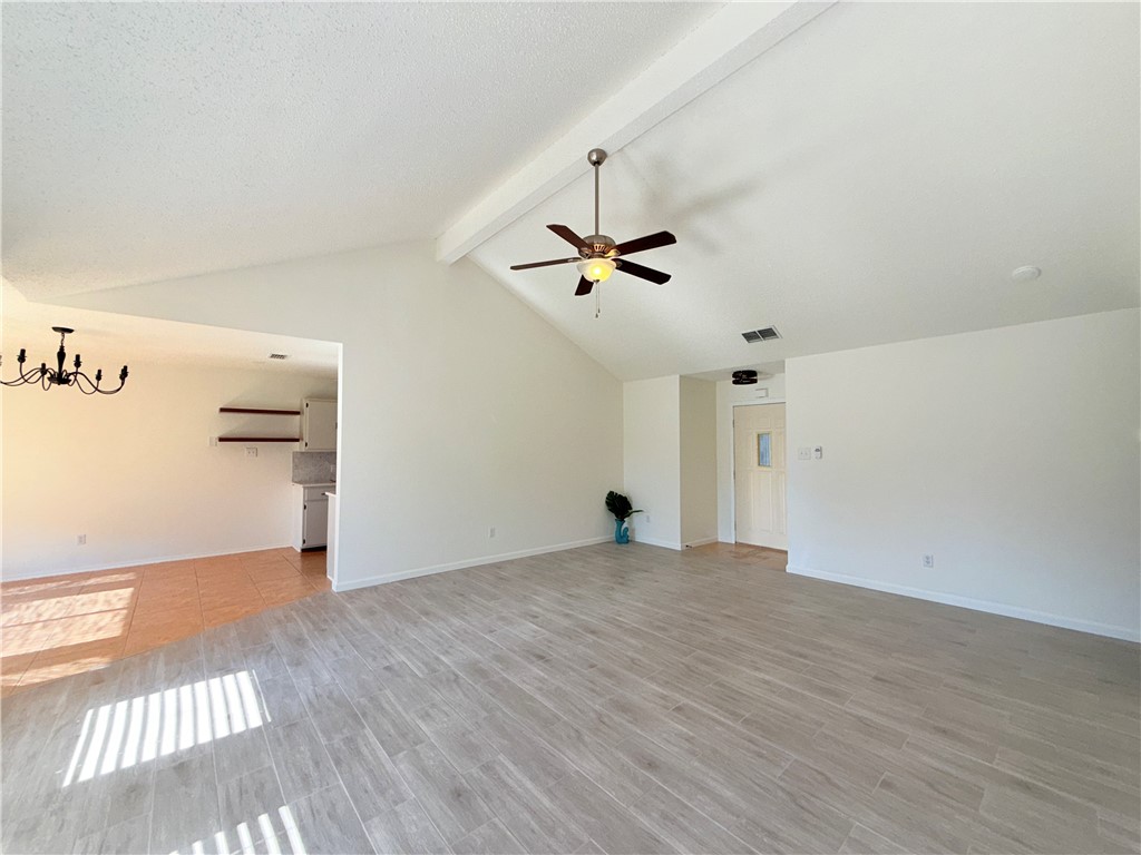 2229 Pebble Beach Drive Ingleside, TX 78362 - Photo 2 of 33 a view of empty room with wooden floor and fan