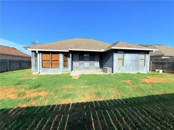 a front view of house with yard