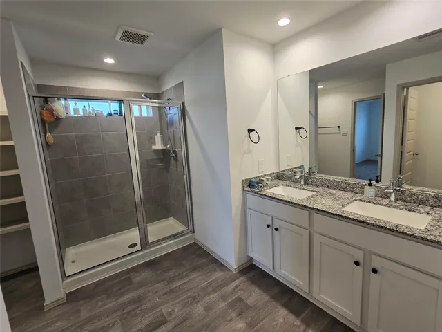 a view of a room with racks on the wall