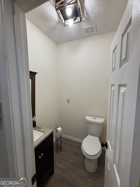 771 Hamilton Road Concord, GA 30206 - Photo 9 of 30 a white toilet sitting next to a bathroom sink