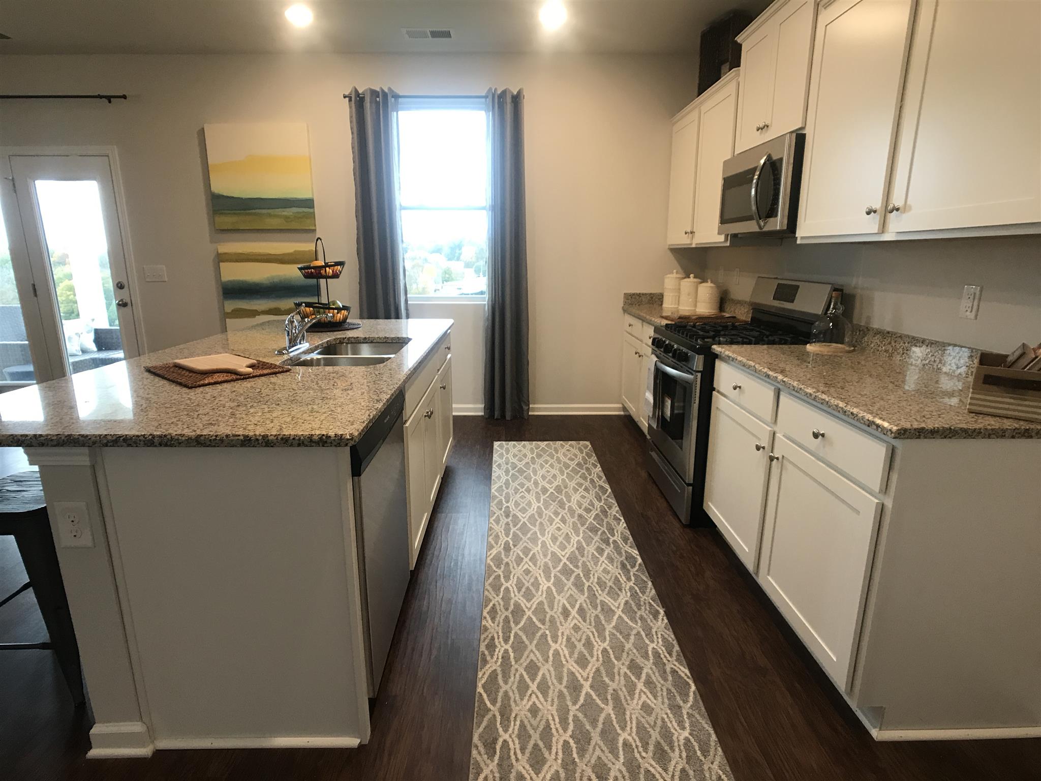 773 Prominence Road, Unit 106 Columbia, TN 38401 - Photo 5 of 30 Beautiful granite countertops and stainless appliances on every home - not an upgrade!!