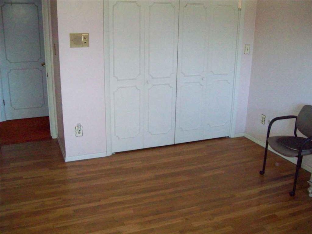 124 Herbst Road Coraopolis, PA 15108 - Photo 13 of 24 a view of a livingroom with wooden floor and lounge chair