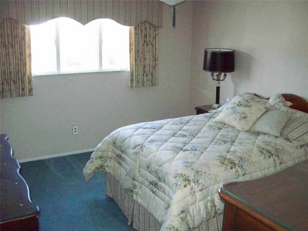 124 Herbst Road Coraopolis, PA 15108 - Photo 14 of 24 a bedroom with a bed and a window