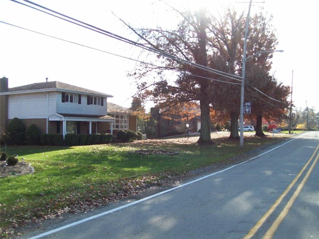 124 Herbst Road Coraopolis, PA 15108 - Photo 6 of 24 a view of a house with a yard