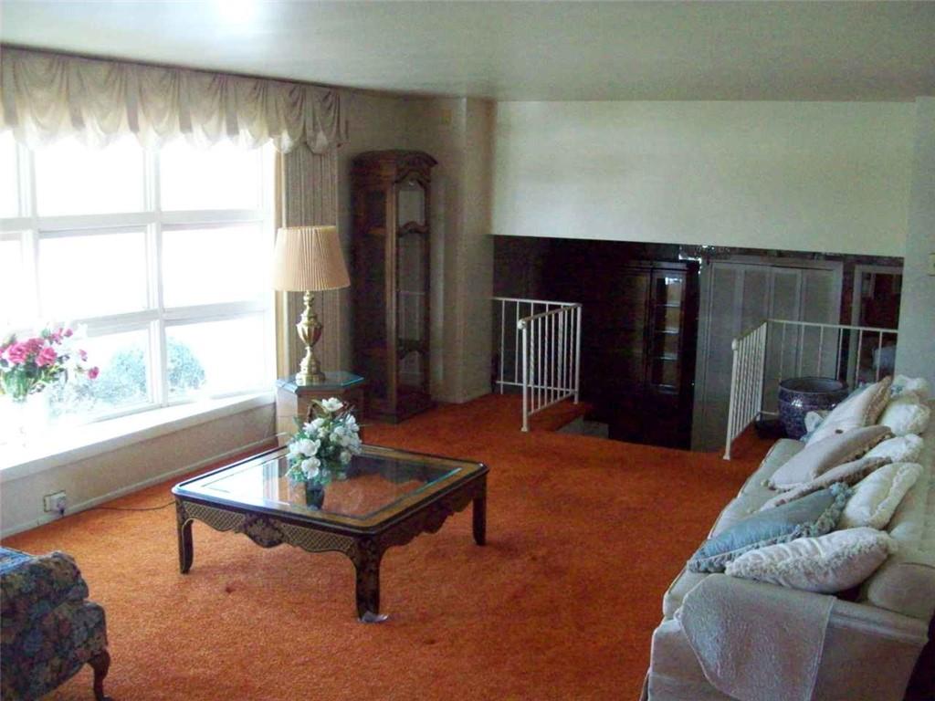 124 Herbst Road Coraopolis, PA 15108 - Photo 8 of 24 a living room with furniture and a window