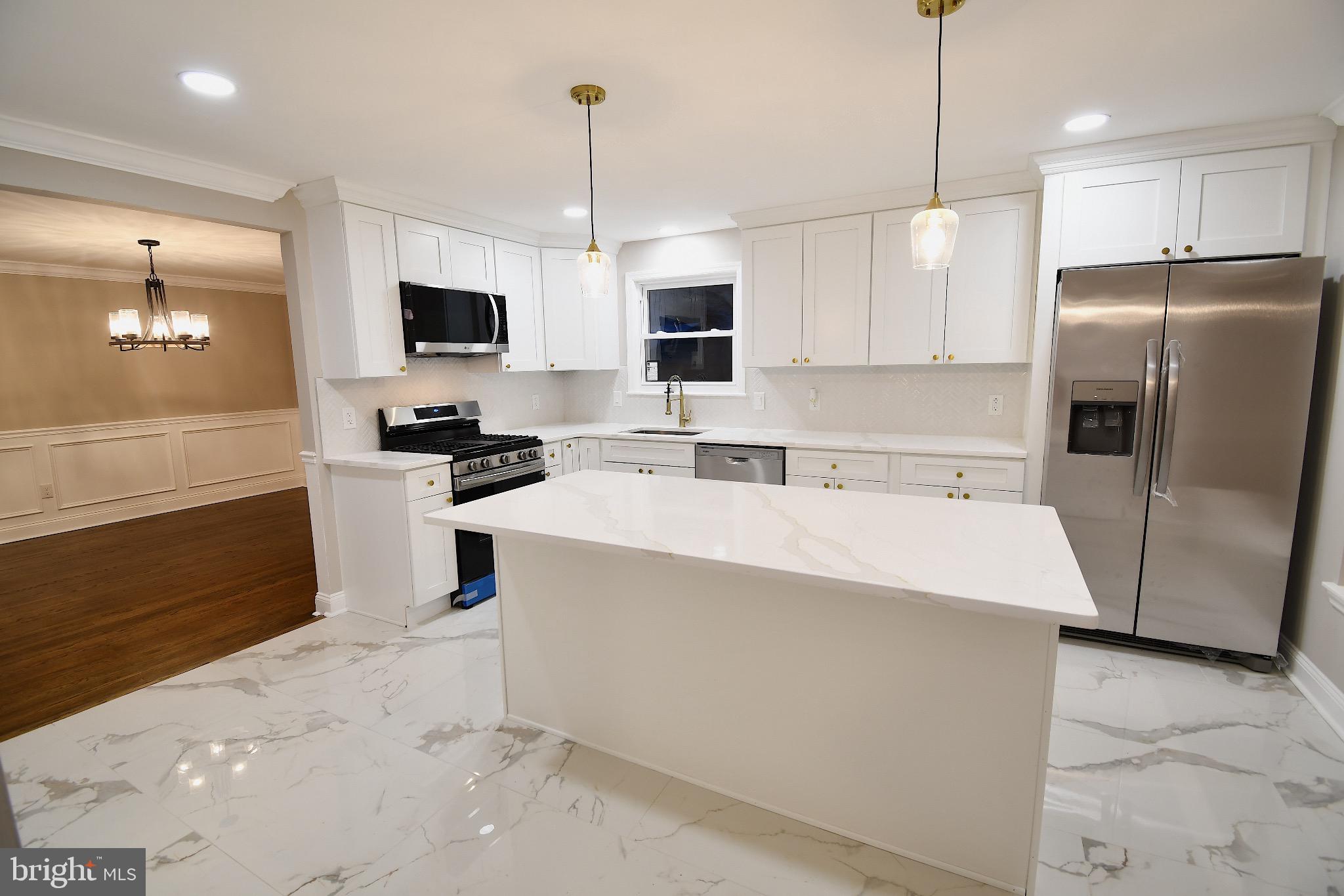 25 Champlain Road Marlton, NJ 08053 - Photo 13 of 40 Modern kitchen with sleek finishes.
