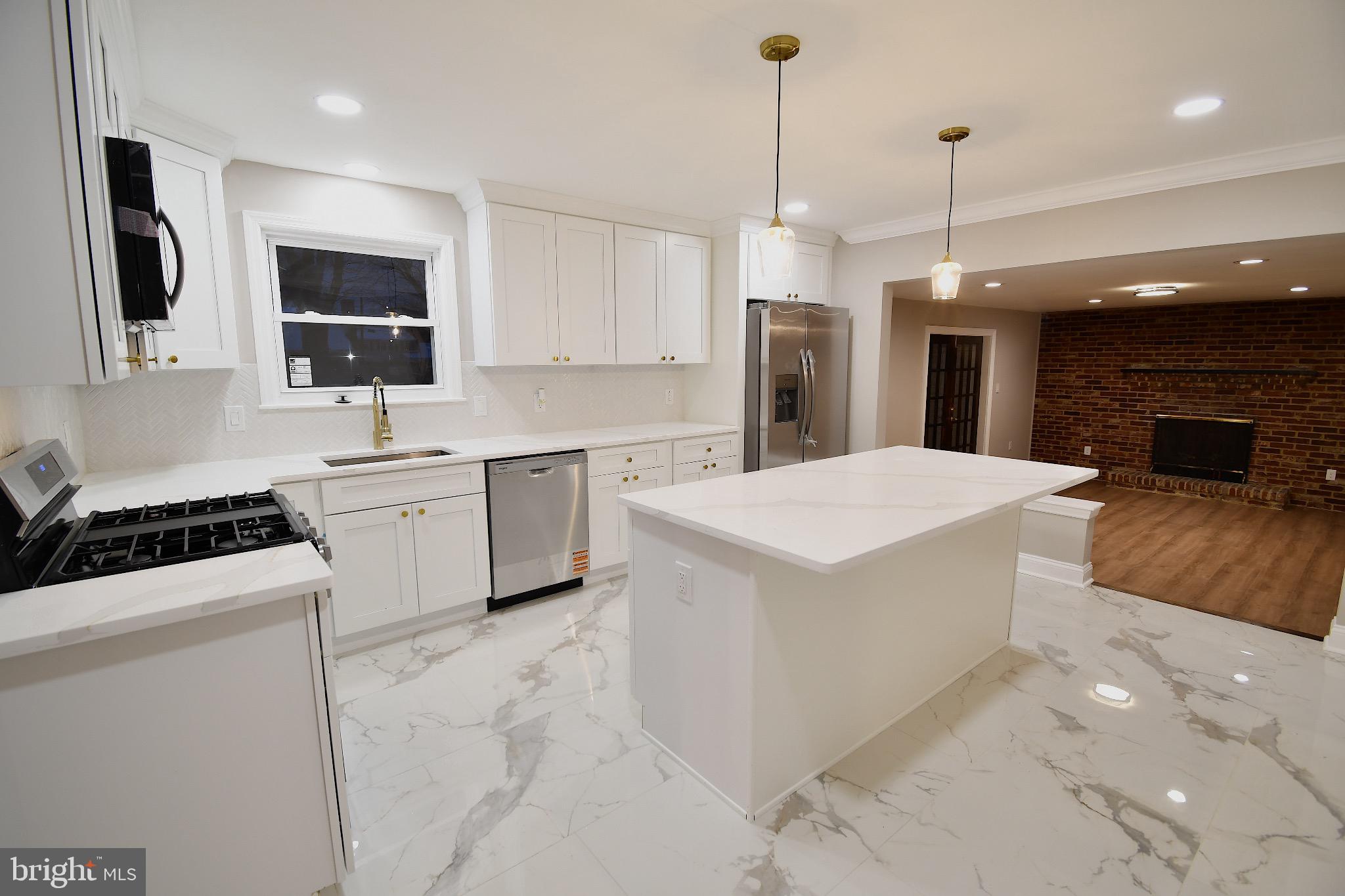 25 Champlain Road Marlton, NJ 08053 - Photo 17 of 40 Modern kitchen with sleek finishes.