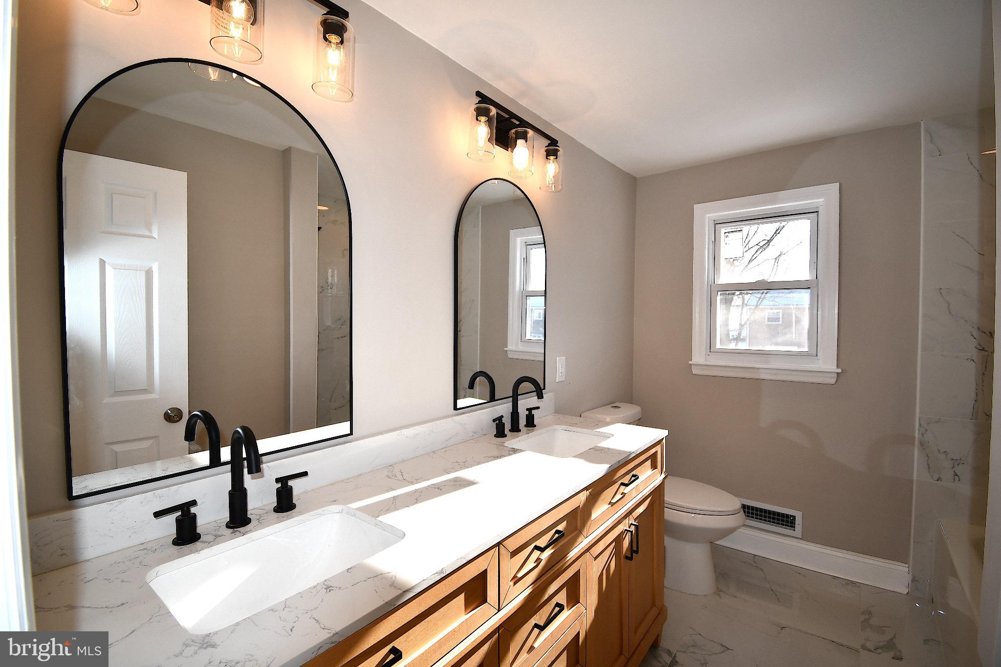 25 Champlain Road Marlton, NJ 08053 - Photo 22 of 40 Elegant bathroom with modern fixtures.