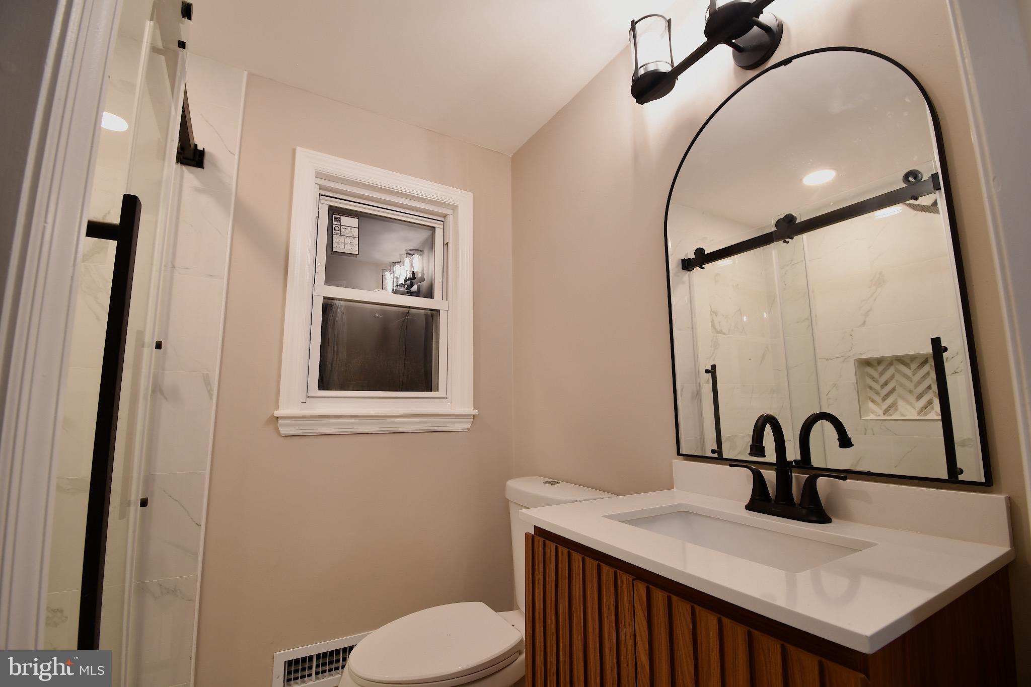 25 Champlain Road Marlton, NJ 08053 - Photo 26 of 40 Modern bathroom with elegant fixtures.
