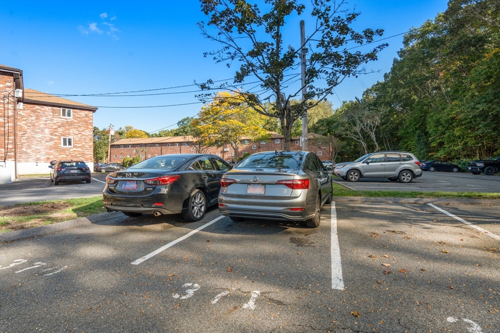 23 Westgate Road, Unit 6 Chestnut Hill, MA 02467 - Photo 17 of 19 a view of a cars parked on the side of a street