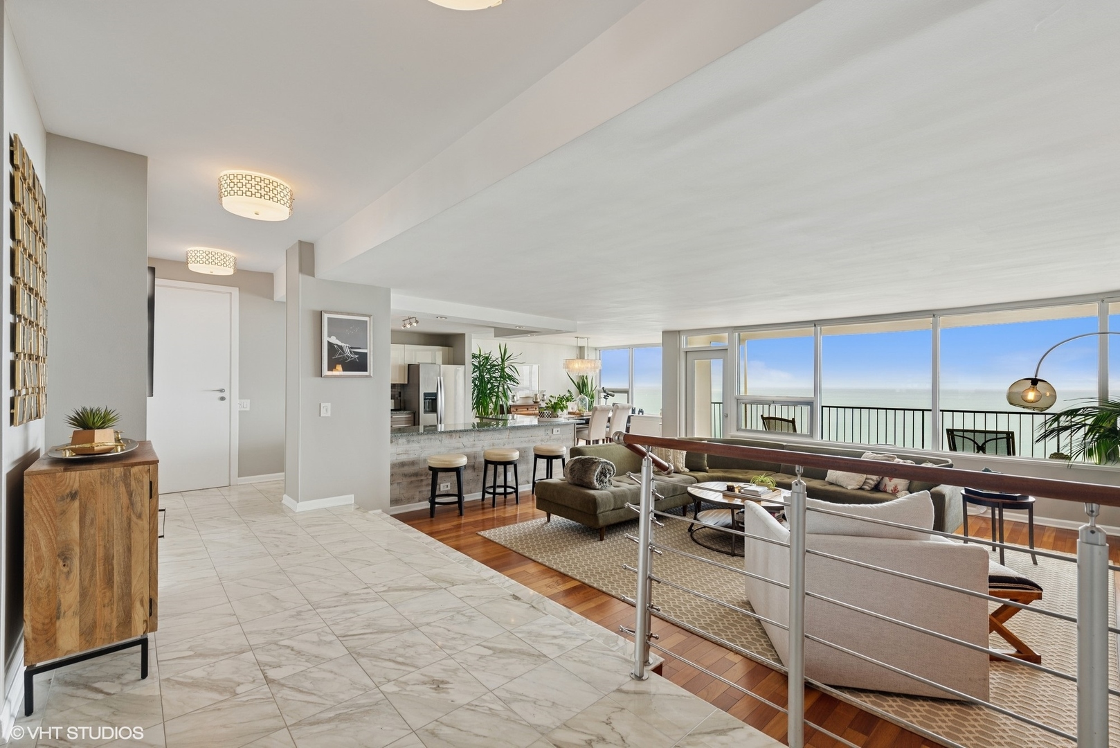 5733 North Sheridan Road, Unit 29D Chicago, IL 60660 - Photo 20 of 40 a kitchen with stainless steel appliances a stove a refrigerator a sink and cabinets