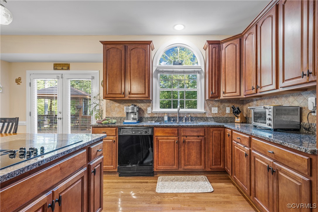 3541 Kings Farm Drive Midlothian, VA 23113 - Photo 15 of 49 a kitchen with stainless steel appliances granite countertop a sink stove and cabinets