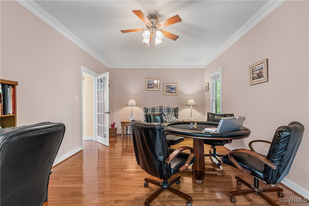 3541 Kings Farm Drive Midlothian, VA 23113 - Photo 20 of 49 a view of a dining room with furniture and wooden floor