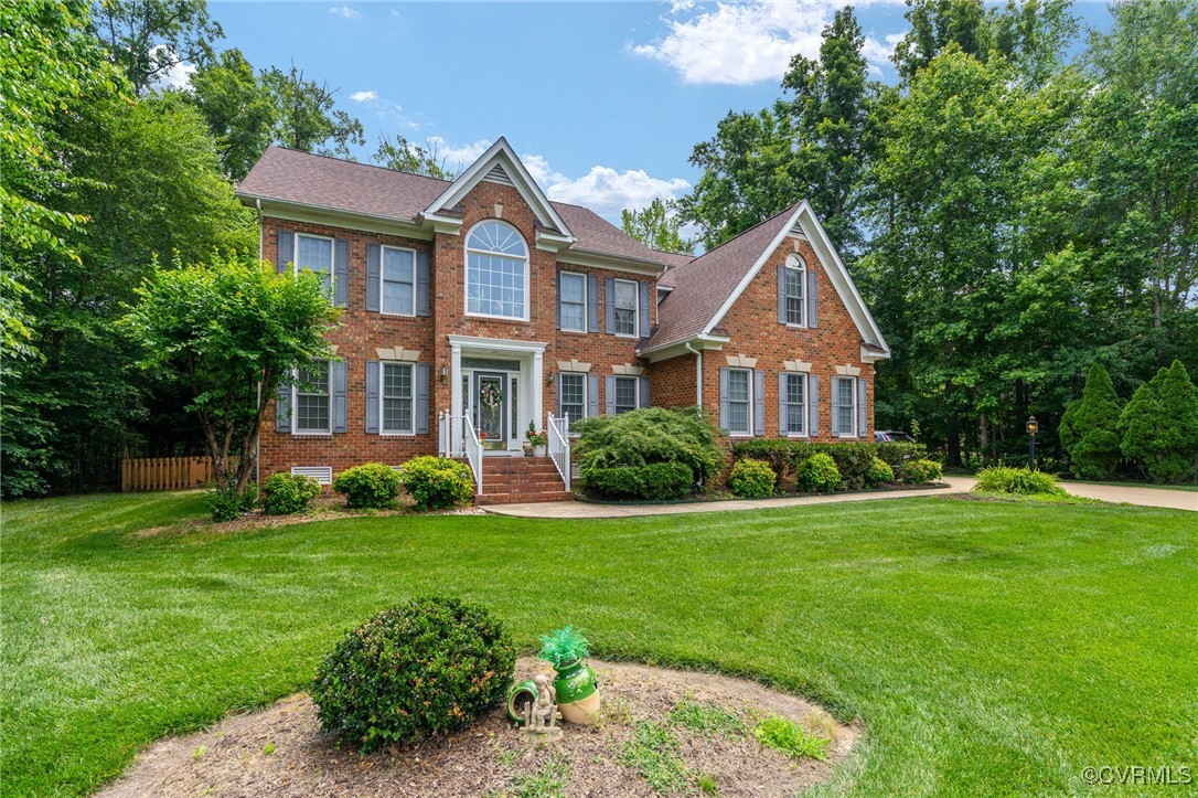 3541 Kings Farm Drive Midlothian, VA 23113 - Photo 2 of 49 a front view of a house with a yard