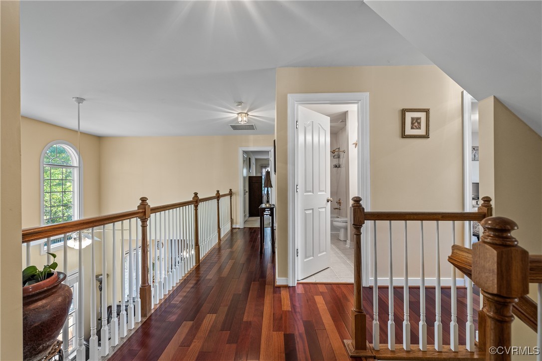 3541 Kings Farm Drive Midlothian, VA 23113 - Photo 21 of 49 a view of a hallway with wooden floor and stairs