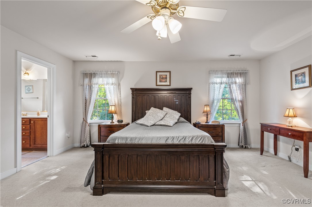 3541 Kings Farm Drive Midlothian, VA 23113 - Photo 23 of 49 a bedroom with a bed and a chandelier