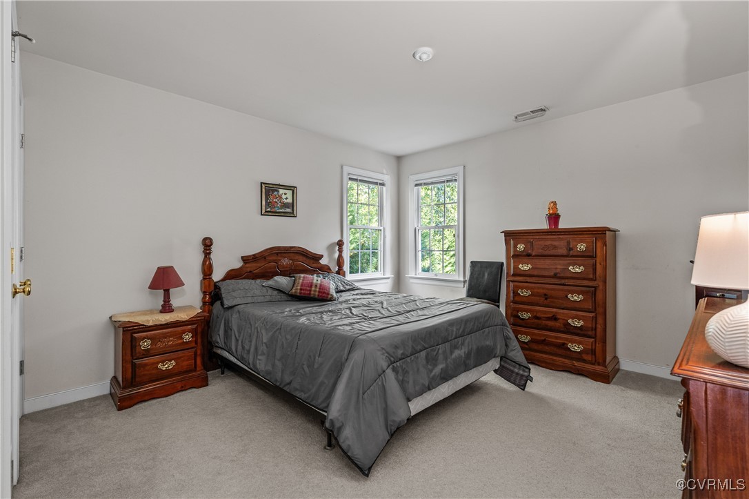 3541 Kings Farm Drive Midlothian, VA 23113 - Photo 29 of 49 a bedroom with a bed and a dresser